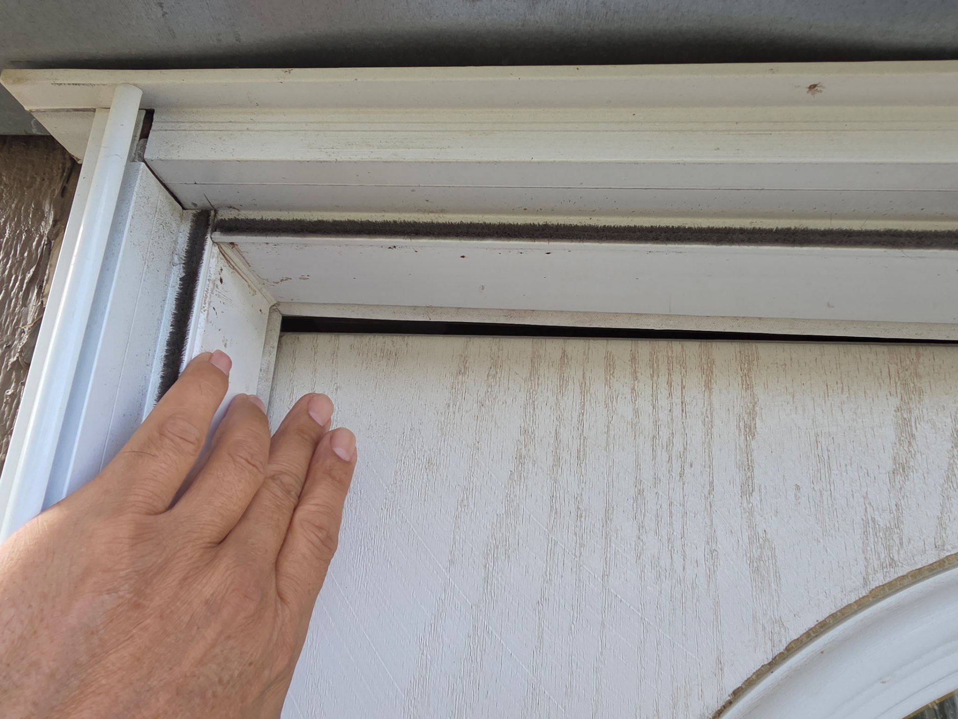 Gap around a door frame caused by an unlevel mobile home