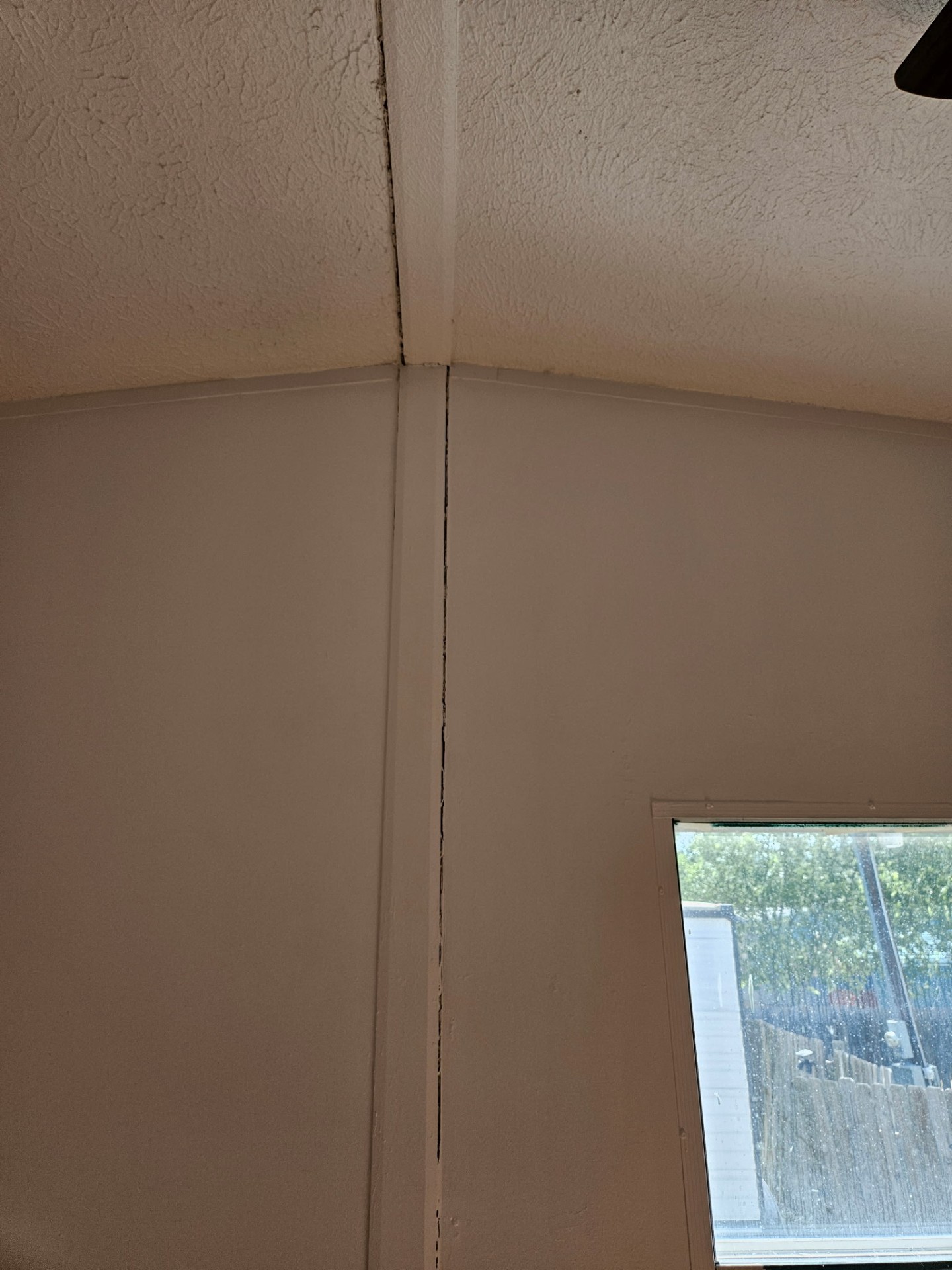 Separation along the marriage line of a double-wide home ceiling